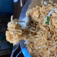 28. Pad Thai Noodle · Stir fried Thai noodles with egg bean sprouts, dry tofu topped with ground peanuts. Hot and ...