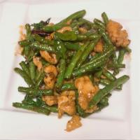 42. String Bean · Stir fried with string bean, chili paste and lime leaves. Hot and spicy. Served with jasmine...