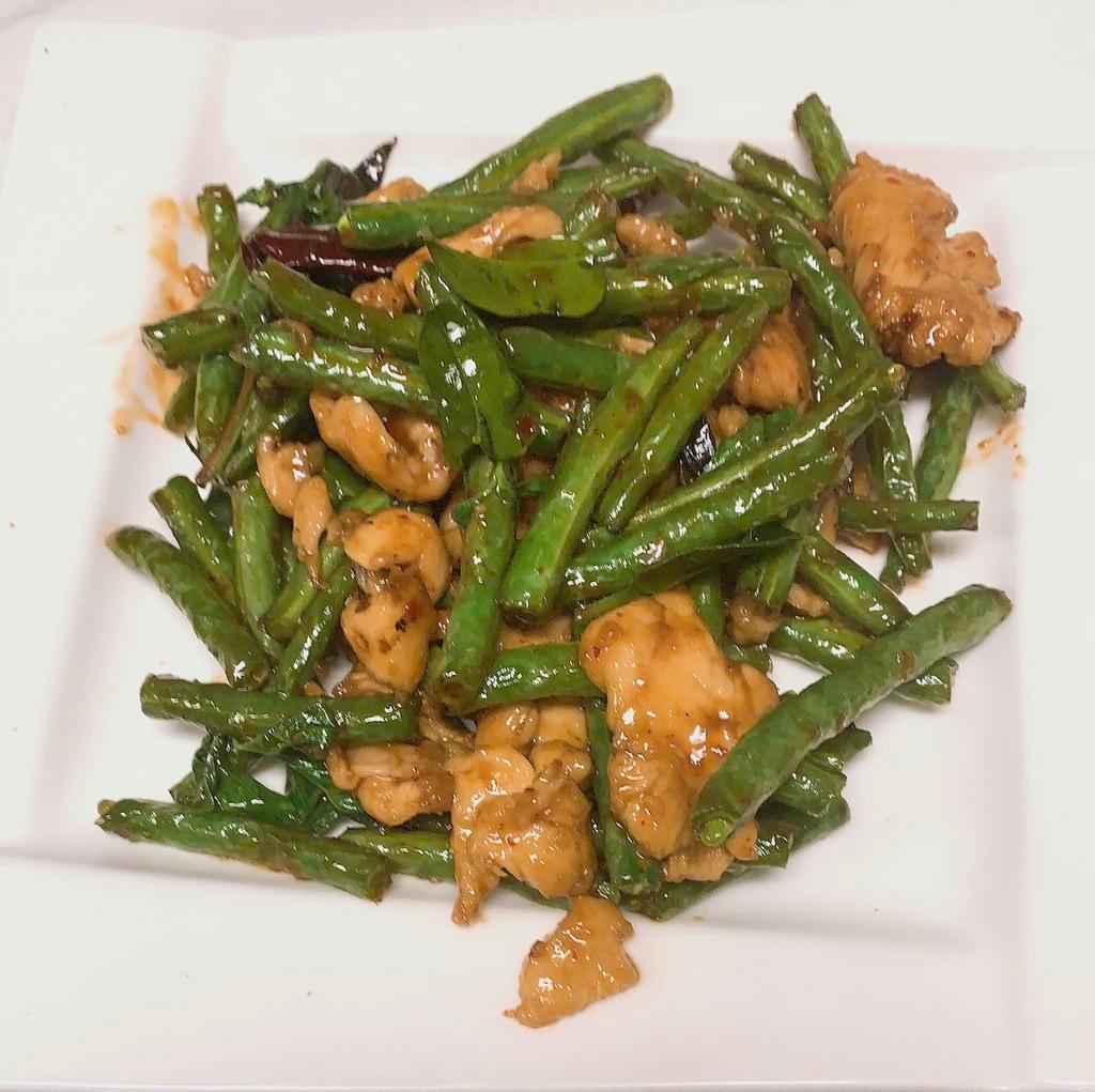 42. String Bean · Stir fried with string bean, chili paste and lime leaves. Hot and spicy. Served with jasmine rice.