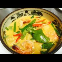 55. Panang Curry · Basil, bell pepper, mushroom, zucchini, string beans, and carrots. Served with jasmine rice....