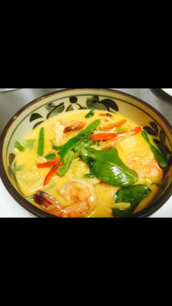 55. Panang Curry · Basil, bell pepper, mushroom, zucchini, string beans, and carrots. Served with jasmine rice. Hot and spicy.