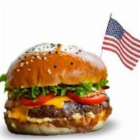 American Burger · Beef patty with double American cheese.
