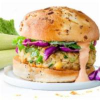 Zucchini Burger · Vegetarian. Zucchini patty (zucchini, carrot, flour, egg, feta, parsley, onion) served with ...