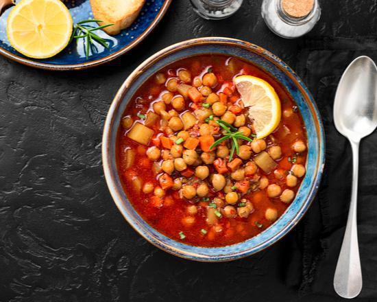 Chana Masala · Chickpeas simmered in a tomato stew served with a side of basmati rice. Vegan. Gluten free.