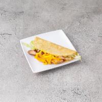 22. Chicken Taco · Served with iceberg lettuce, tomato and topped with cheddar cheese.