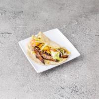 23. Steak Taco · Served with iceberg lettuce, tomato and topped with cheddar cheese.
