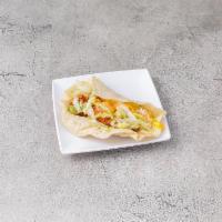 24B. Fish Taco · Served with iceberg lettuce, tomato and topped with cheddar cheese.