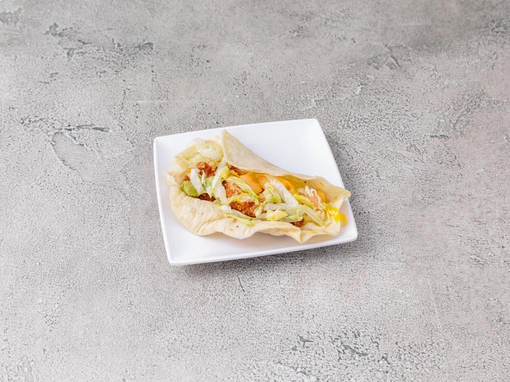 24B. Fish Taco · Served with iceberg lettuce, tomato and topped with cheddar cheese.