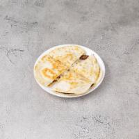 36. Jack Cheese and Grilled Steak Quesadilla · 2 fresh flour tortillas stuck together and melted cheese.