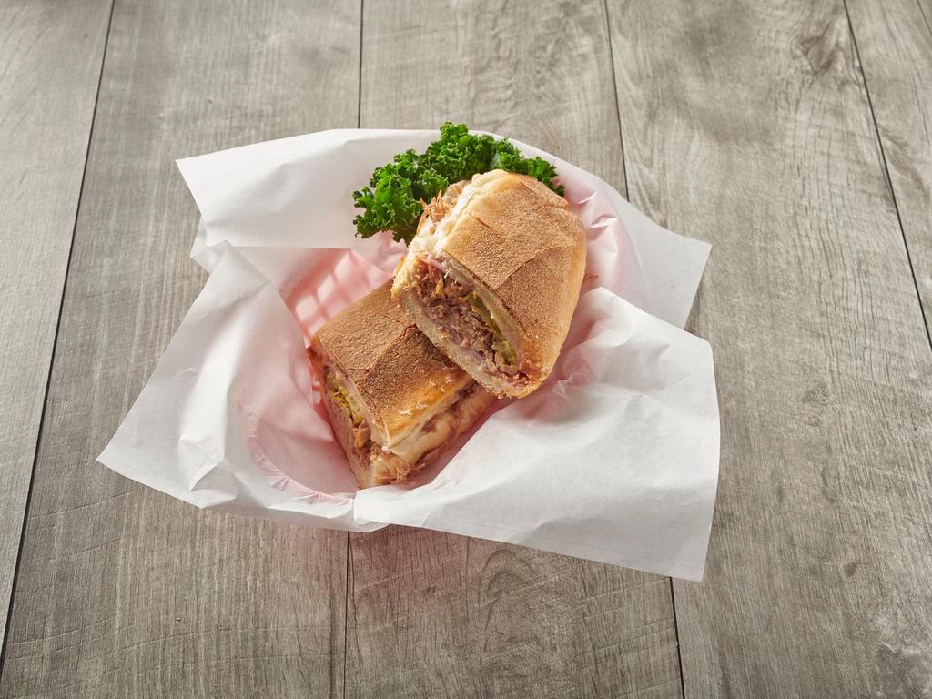 Sandwich Cubano · Cuban sandwich. 