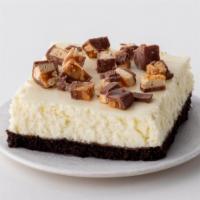 Snickers Icebox Bar to go · Our Snickers Icebox Bar has a chocolate wafer crust layered with peanut butter and cream che...