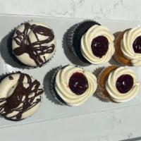 6 Piece Assorted Cupcakes 3 · 2 vanilla raspberry cupcakes, 2 chocolate cream cheese, 2 chocolate cupcakes with raspberry ...