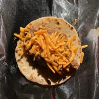 Bean and Cheese Tacos · Two bean and cheese tacos with refried Rancho Gordo pinto beans and cheddar cheese on fresh ...