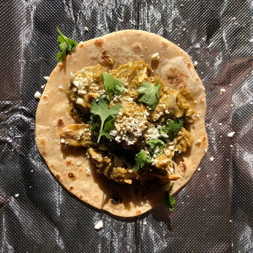 Chicken Verde Tacos · 2 tacos. Shredded chicken cooked in salsa verde on fresh flour tortillas.  