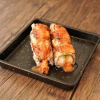Black Dragon Roll · Shrimp tempura and avocado topped with eel and special sauce.