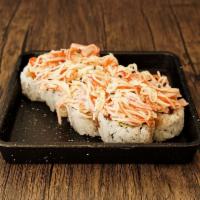 Fire Double Crab Roll · Crab tempura and avocado topped with spicy crab nobu style.