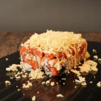 Fire Fight Roll · Spicy tuna, crab, and cucumber topped with spicy tuna, crunch, and special sauce.
