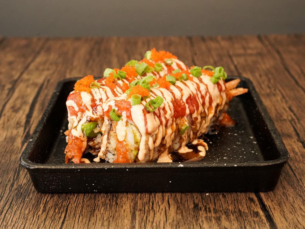 Spicy Red Dragon Roll · Shrimp tempura and avocado topped with spicy tuna and special sauce.