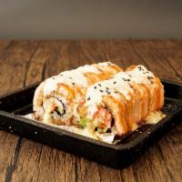 Bake Salmon Roll · Crab, avocado, and cucumber topped with salmon, baked with special sauce.