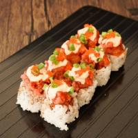 Triple C Roll · Crab tempura and cream cheese topped with spicy tuna, masago, scallion, and spicy special sa...
