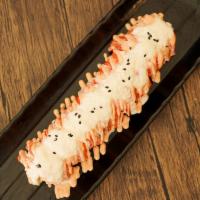 Snowy Roll · Salmon, cream cheese, and avocado topped with crab meats, spicy mayo, and pineapple mango sa...