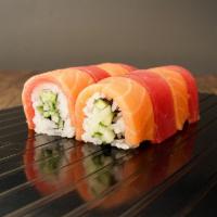 Sunset Roll · Avocado and cucumber inside topped with salmon and tuna.