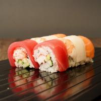 Rainbow Roll · Crab, avocado, and cucumber topped with tuna, salmon, white tuna, and shrimp.