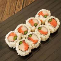 Ocean Roll · White tuna, spicy tuna, and asparagus topped with spicy crab salad.