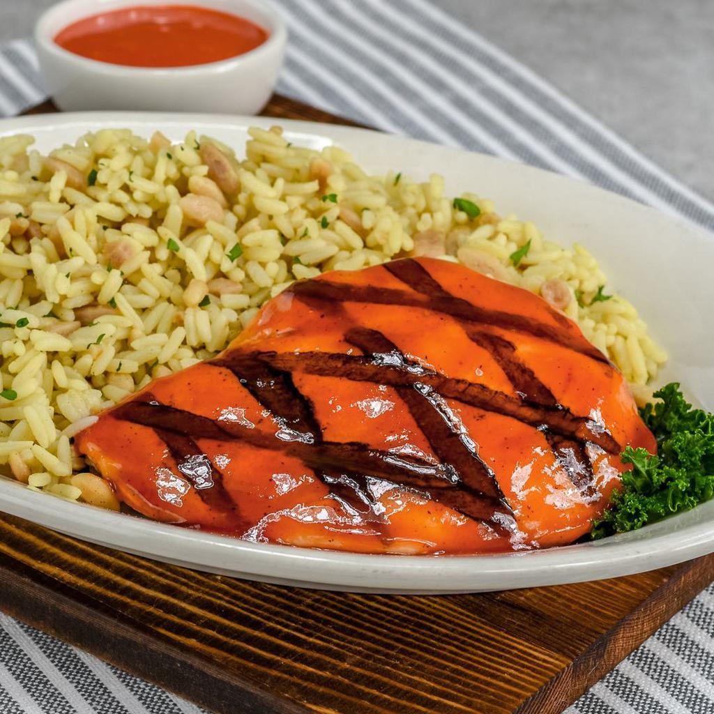 Grilled Chicken Monterey · A marinated  6oz. breast basted in our signature Sweet & Tangy dressing .  Includes your choice of potato, roll and side garden salad.