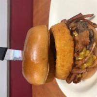 1/2 Pound Classic Steak Bacon Onion Burger · Fresh steak burger cooked to your choice of doneness served with bacon, fried onion rings, s...