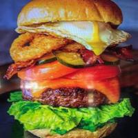 1/2 Pound Hangover Burger · Fresh steak burger cooked to your choice of doneness topped with sliced cheddar cheese, baco...