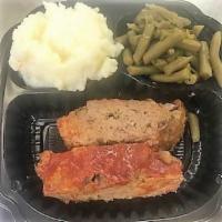 Homemade Meatloaf · Home-style meatloaf topped with brown sugar-sweetend ketchup.  Includes your choice of two s...