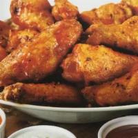 Jumbo Wings · Jumbo naked wings deep fried to perfection then tossed in your sauce or rub of choice.  Serv...