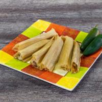 Jalapeno Pork Dozen Spicy · These tamales are just right for those who enjoy a little spice in their life. The tamales a...