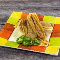 Dozen Jalapeno Bean Tamale  · The jalapeno bean tamales have become quite popular in recent years. The jalapenos add a cer...