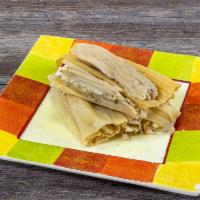 Tomatillo Chicken and Cheese · Our tomatillo chicken and cheese tamales offer a delightful combination of robust flavors. T...