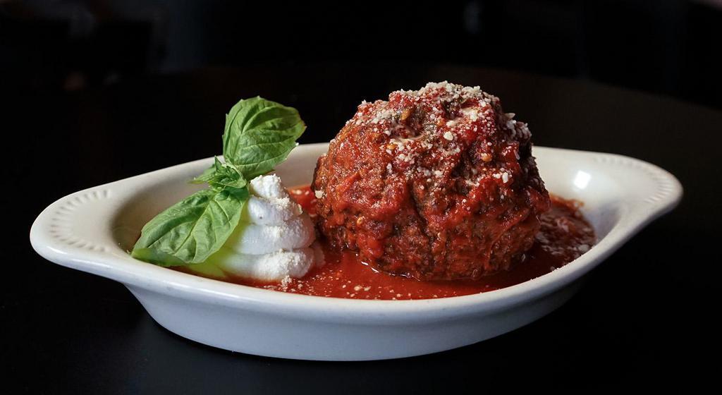 Mama's Meatball · one large beef meatball stuffed with fresh mozzarella with tomato sauce & ricotta