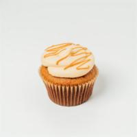 Salted Caramel Cupcake · Caramel cake with caramel center, topped with salted caramel frosting.