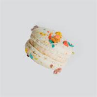 Fruity Pebble Macaron · Fruity pebble speckled shell filled with fruity pebble buttercream.