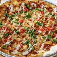 Chicken Bacon Ranch Pizza · Grilled chicken, applewood bacon, spinach, grape tomatoes and mozzarella cheese drizzled wit...
