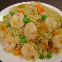 Shrimp Fried Rice · Shrimp, stir-fried white rice with eggs, peas and carrots flavored with soy sauce.