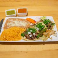 1. Taco Plate · Chicken or pork.
3tacos rice and beans
With onion and cilantro
