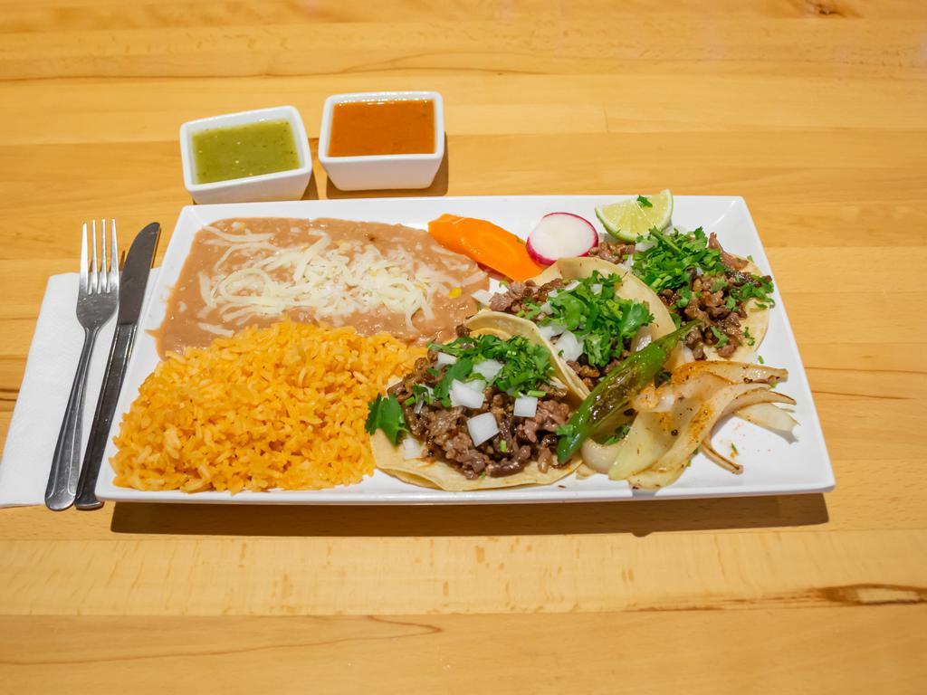 1. Taco Plate · Chicken or pork.
3tacos rice and beans
With onion and cilantro