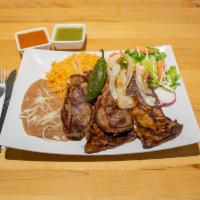 12. Carne Asada Plate · Beef steak sirved with rice beans tortillas and salsa