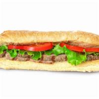 Steak Sandwich Breakfast · Bistec. Lettuce, tomatoes, and red onions.