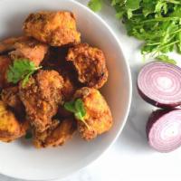 Chicharrones de Pollo · Fried chicken chunks.