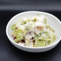 Caesar Salad · romaine, radicchio, house croutons, parmesan reggiano, caesar dressing.