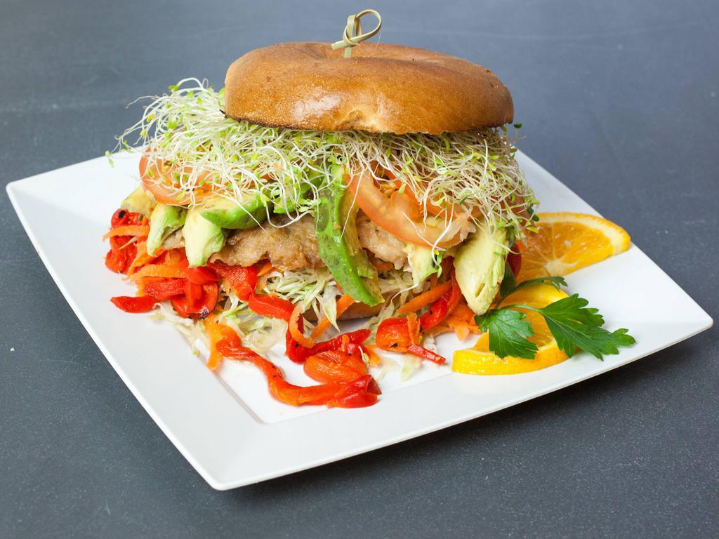 Vegan Avocado Sandwich · Vegan Chiken Avocado, tomato, carrots, lettuce, sprouts and roasted peppers.