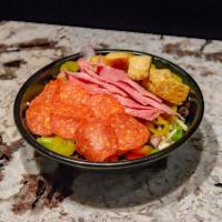 Antipasto Salad · Chopped lettuce with ham, pepperoni, salami, black olives, green peppers, banana peppers, re...