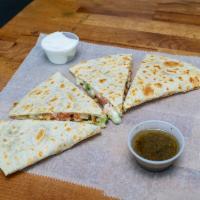 Chicken Quesadilla · Pico de gallo and chicken.
sour cream and salsa on side.